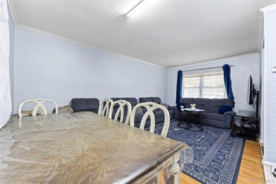 Welcome home to this inviting brick semi-attached single-family - photo 7