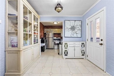 Welcome home to this inviting brick semi-attached single-family - photo 10