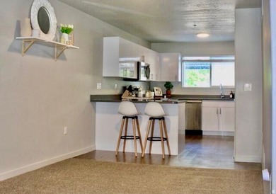 Main-floor condo in the heart of Springville. This unit offers a - photo 4