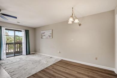 Enjoy comfortable coastal living in this bright and inviting - photo 12