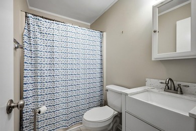 Enjoy comfortable coastal living in this bright and inviting - photo 17