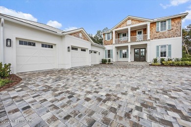 Welcome to 130 Whistling Palm Court, an exceptional brand-new - photo 3