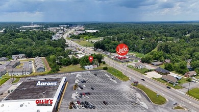 Location, location, location! This versatile commercial property - photo 3