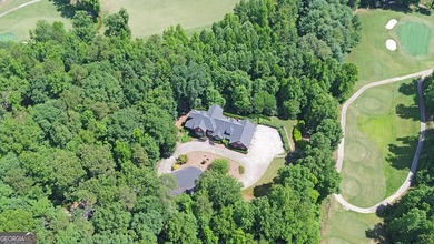 GOLF COMMUNITY MASTERPIECE! Spectacular 4-sided brick home - photo 12