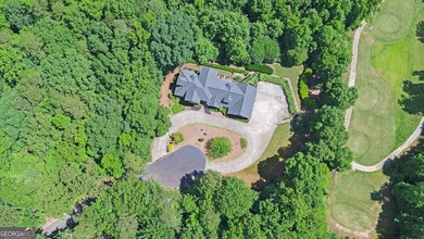GOLF COMMUNITY MASTERPIECE! Spectacular 4-sided brick home - photo 13