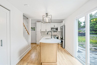 Turnkey Renovated Farmhouse-Style Cape - Elwood School District - photo 11