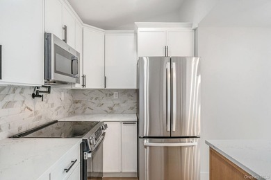 Turnkey Renovated Farmhouse-Style Cape - Elwood School District - photo 12