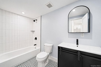 Turnkey Renovated Farmhouse-Style Cape - Elwood School District - photo 16
