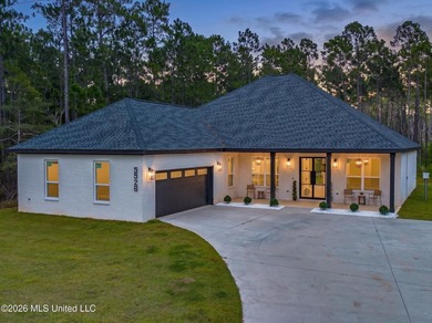 Welcome to this stunning custom-built 2025 home, where modern - photo 1
