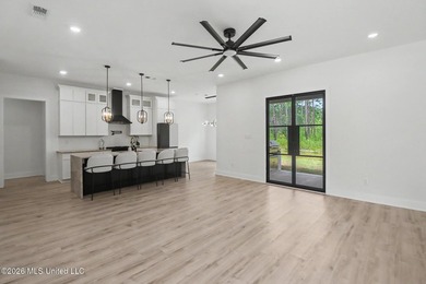 Welcome to this stunning custom-built 2025 home, where modern - photo 5