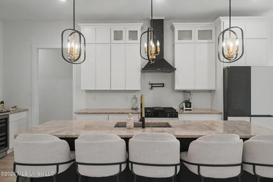 Welcome to this stunning custom-built 2025 home, where modern - photo 9