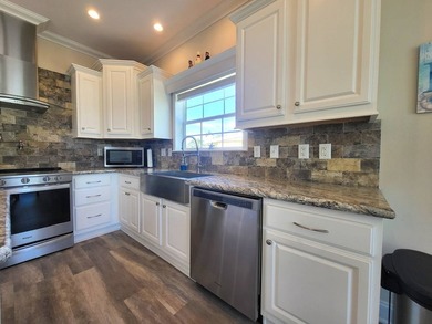 A fabulous open concept floor plan allowing sunlight to flow - photo 11