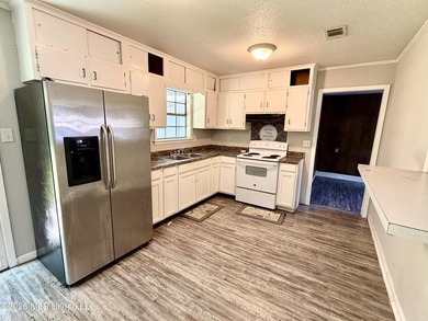 Investor Special ! Brick Home on a Slab. Your chance to do a - photo 3