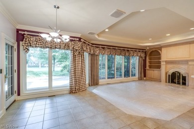 Step into an extraordinary two-story foyer where timeless - photo 12