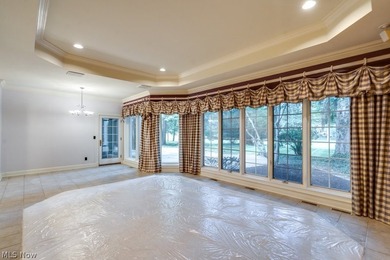 Step into an extraordinary two-story foyer where timeless - photo 13