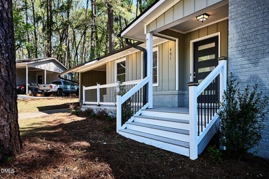 Recently remodeled brick ranch in Garner, NC, offering - photo 3