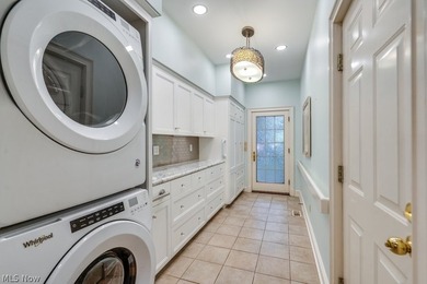 Step into an extraordinary two-story foyer where timeless - photo 18