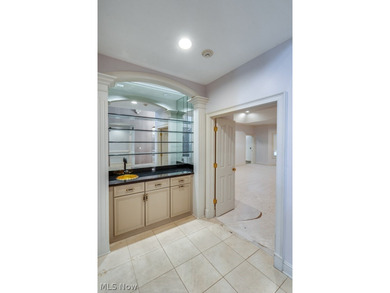 Step into an extraordinary two-story foyer where timeless - photo 19