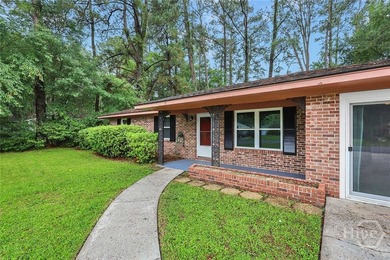 Turnkey & truly one-of-a-kind, this brick Savannah stunner - photo 4