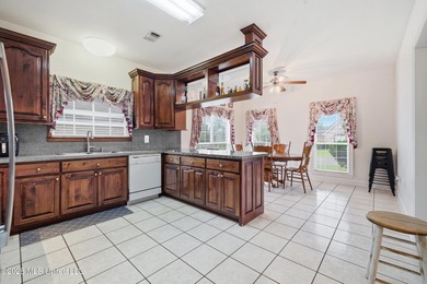 Welcome to this spacious 5-bedroom, 3.5 bath two story brick - photo 9