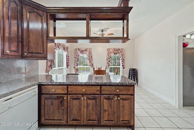 Welcome to this spacious 5-bedroom, 3.5 bath two story brick - photo 10