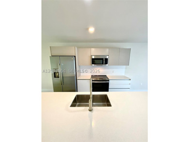 Aventura Village, a gated residential community completed in - photo 4