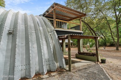 Tucked away down a quiet dirt road on 4.83 private acres on - photo 11