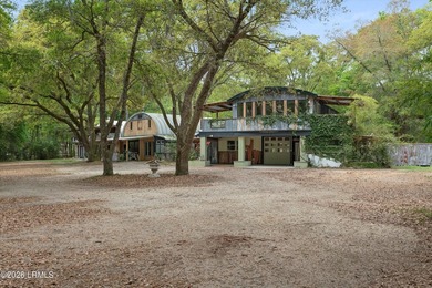 Tucked away down a quiet dirt road on 4.83 private acres on - photo 12