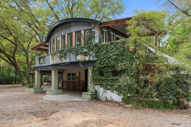 Tucked away down a quiet dirt road on 4.83 private acres on - photo 13