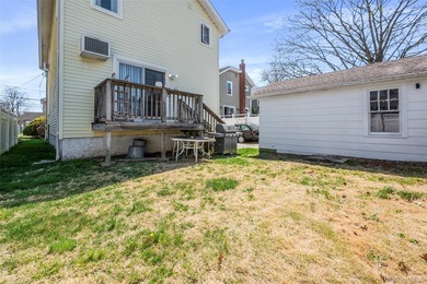 Deceptive from the outside, this expanded Colonial home offers - photo 13