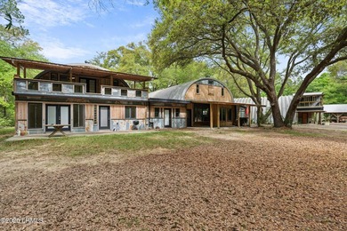 Tucked away down a quiet dirt road on 4.83 private acres on - photo 18