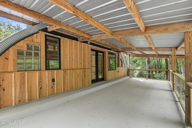 Tucked away down a quiet dirt road on 4.83 private acres on - photo 35