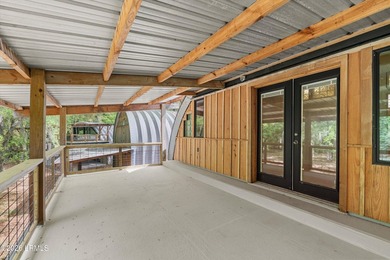 Tucked away down a quiet dirt road on 4.83 private acres on - photo 36