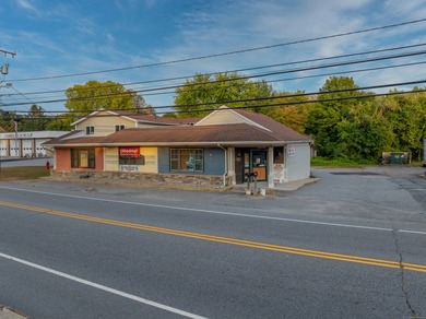 This versatile property offers the perfect blend of business and