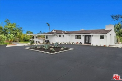 Located within the gated Bradbury Oaks Estates community, this - photo 1