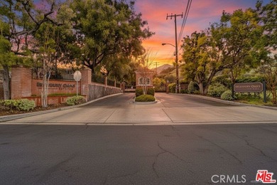 Located within the gated Bradbury Oaks Estates community, this - photo 2