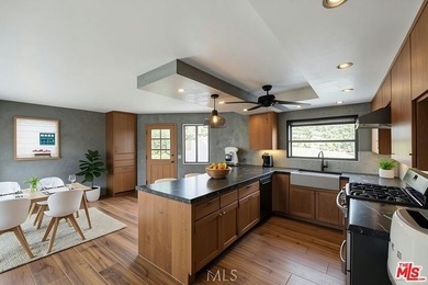 Located within the gated Bradbury Oaks Estates community, this - photo 5