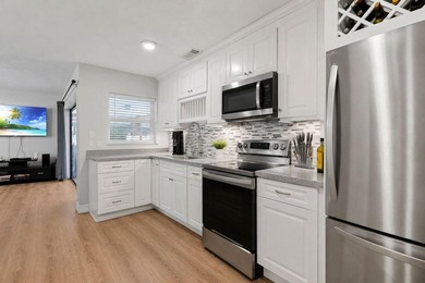 This beautifully maintained waterfront property offers a rare - photo 16