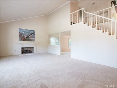 Situated on a quiet street overlooking a lush greenbelt in the - photo 5