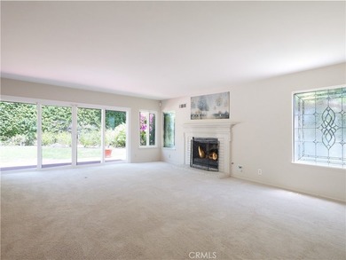Situated on a quiet street overlooking a lush greenbelt in the - photo 6