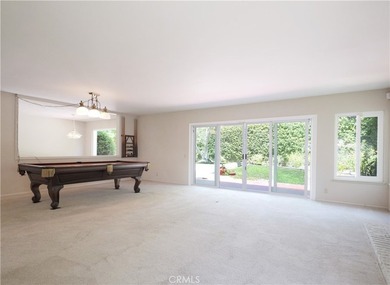Situated on a quiet street overlooking a lush greenbelt in the - photo 8