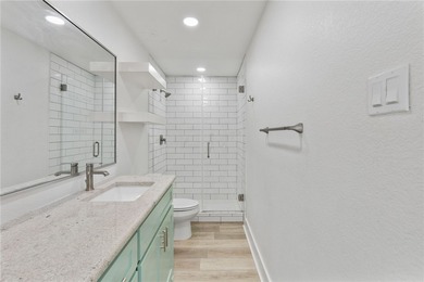 Gorgeous 4 bedroom, 3 bath home located on the water with quick - photo 12