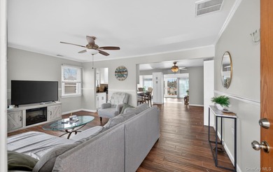 Welcome to this beautifully maintained waterfront ranch in the