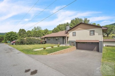 Beautifully renovated tri-level home offering space, comfort - photo 5