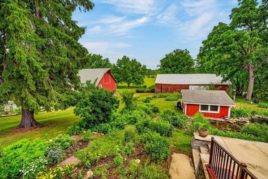 Classic Wisconsin farmhouse & outbuildings on 33+ acres in - photo 12