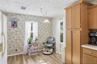Framed by a canopy of mature trees and lush landscaping, this - photo 15