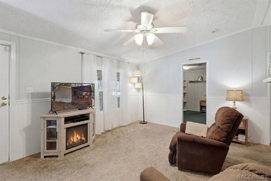 Framed by a canopy of mature trees and lush landscaping, this - photo 21