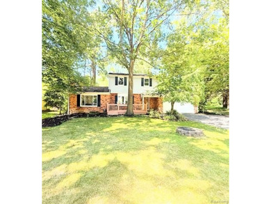 (private lake, pond, creek) Home Sale Pending in Wixom Michigan