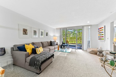 Discover the ease of ground-floor living in this charming condo - photo 5