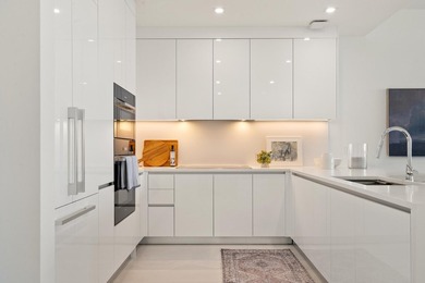 This gorgeous new construction waterfront condo offers bright - photo 4